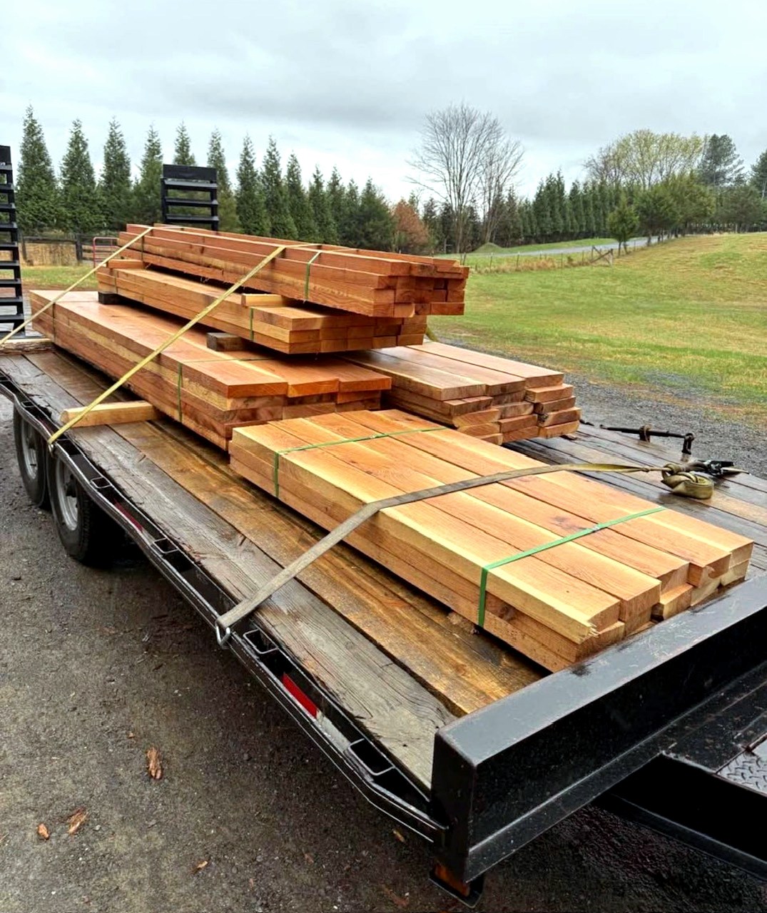 Oak trailer decking loaded on a flatbed trailer